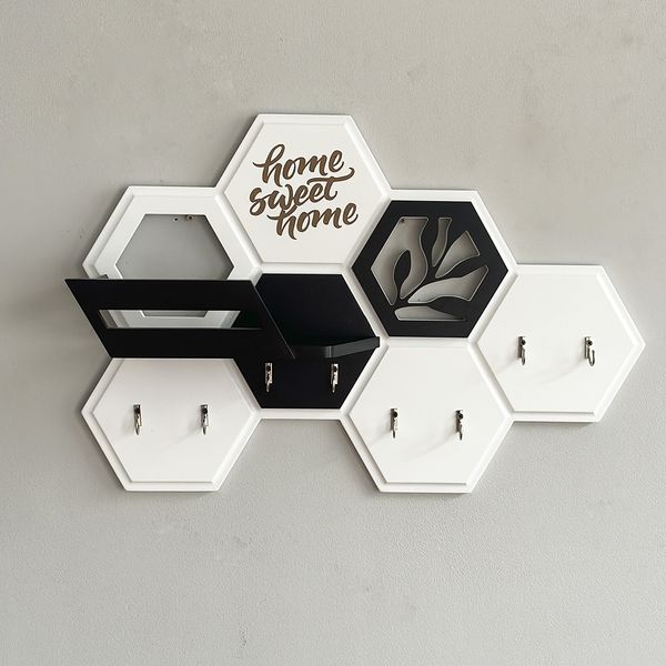 Designer key holder in the shape of a honeycomb