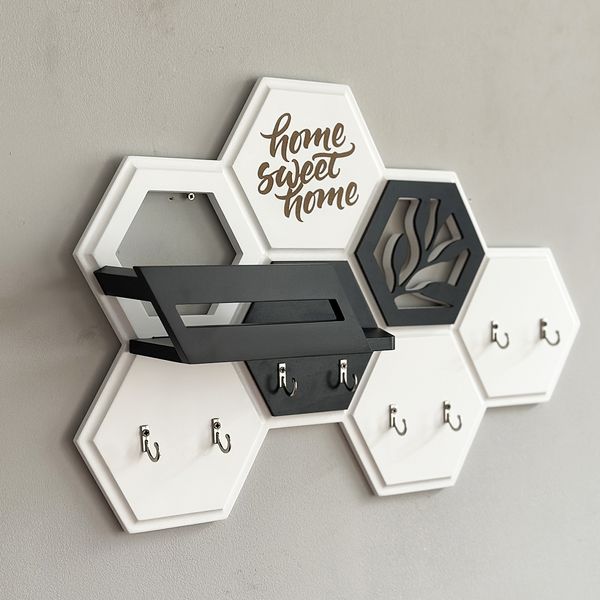 Designer key holder in the shape of a honeycomb