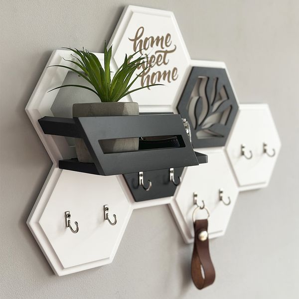 Designer key holder in the shape of a honeycomb