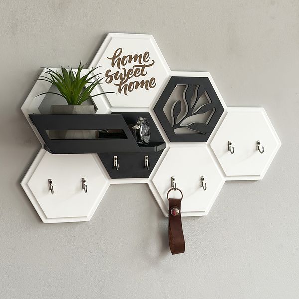 Designer key holder in the shape of a honeycomb