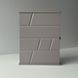 Designer key holder with a door