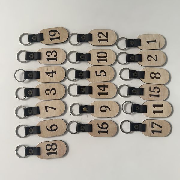 Wooden keychains with leather inserts for a medical center