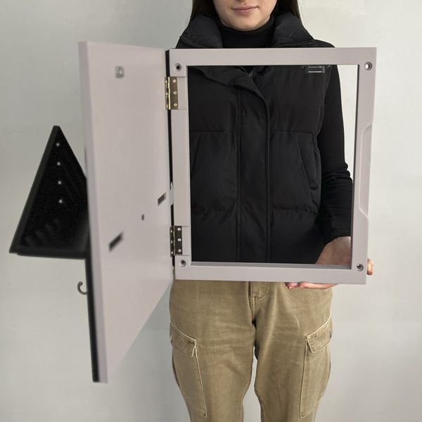 Key holder with a shelf on the shield in original colors