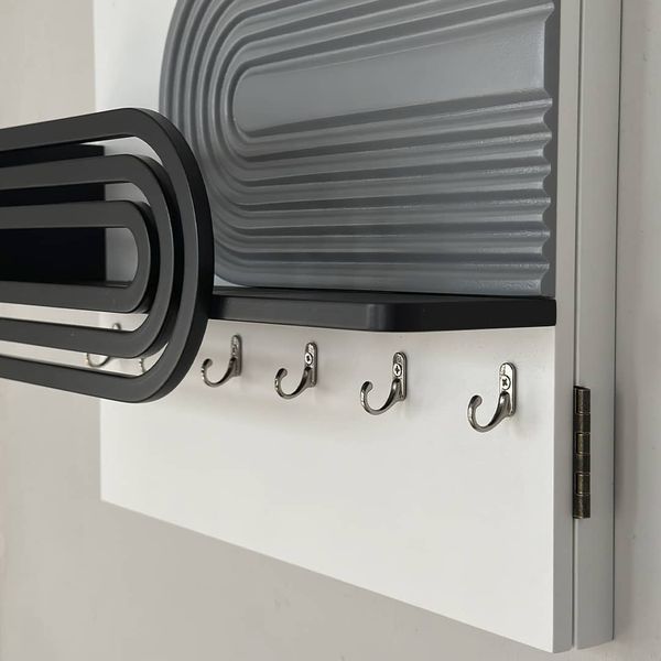 Designer wall key holder on a wooden shield