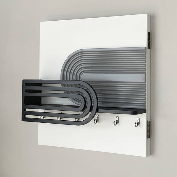 Designer wall key holder on a wooden shield