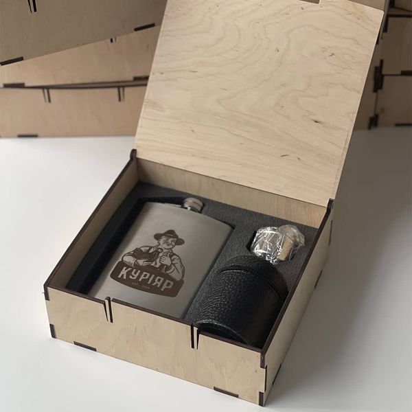 Set of flask with glasses in a wooden box with a logo