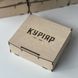 Set of flask with glasses in a wooden box with a logo