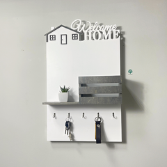 Wall-mounted key holder for the shield