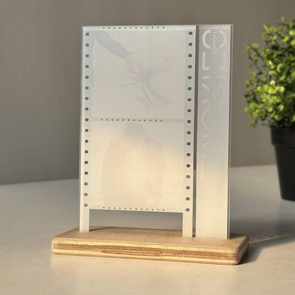 Acrylic photo frame with photo printing on a wooden stand for 2 photos