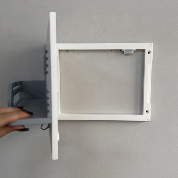 Designer key holder on the shield in white and gray