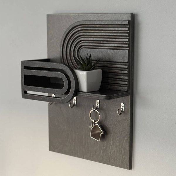 Designer wall key holder in dark colors