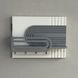 Designer key holder on the shield in white and gray