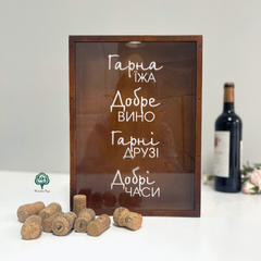 Souvenir piggy bank made of wood for corks with engraving on glass
