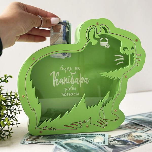 Piggy bank in the shape of a capybara in green color