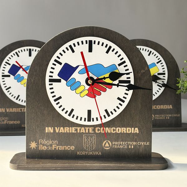 Wooden table clock with company logo