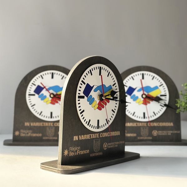 Wooden table clock with company logo