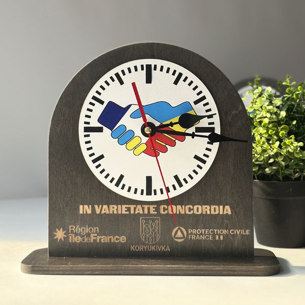 Wooden table clock with company logo