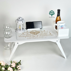 Folding table with engraving for a gift