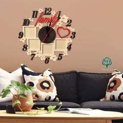 Themed interior clock on the wall with photo frames