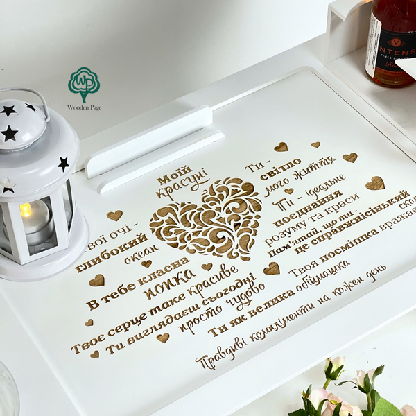 Folding table with engraving for a gift