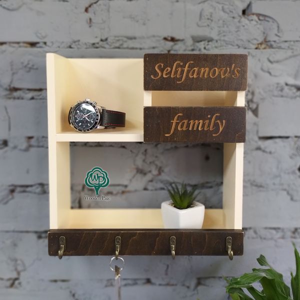 Wooden shelf with family name in the hallway