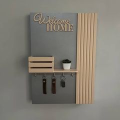 Designer key holder under the shield in silver-beige color