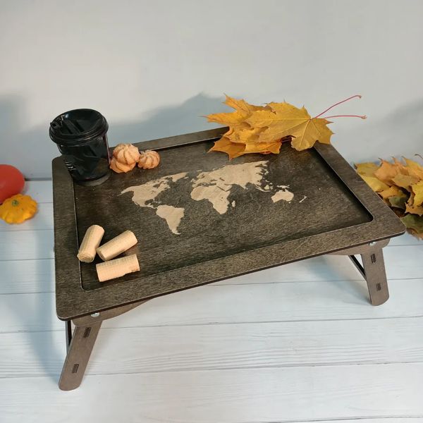 Wooden breakfast table World map