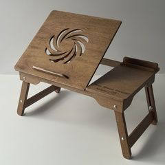 A laptop desk in walnut color as a gift