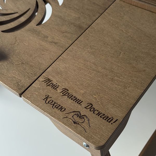 A laptop desk in walnut color as a gift