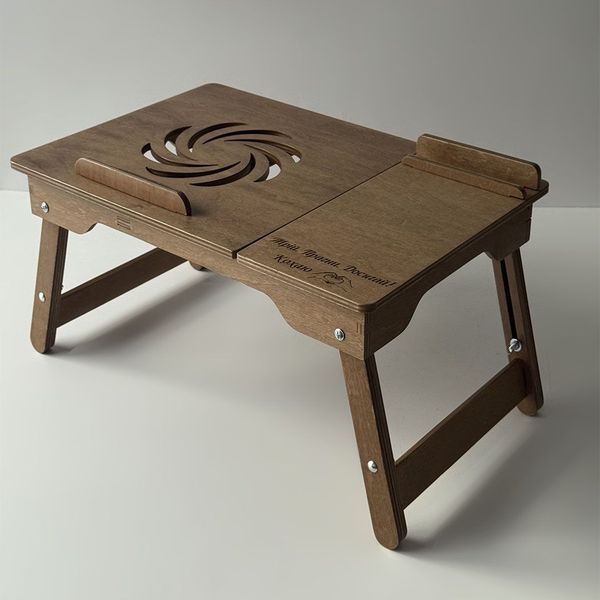 A laptop desk in walnut color as a gift