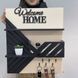 Designer key holder for the shield "Welcome Home" in beige and black