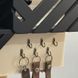 Designer key holder for the shield "Welcome Home" in beige and black