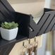 Designer key holder for the shield "Welcome Home" in beige and black