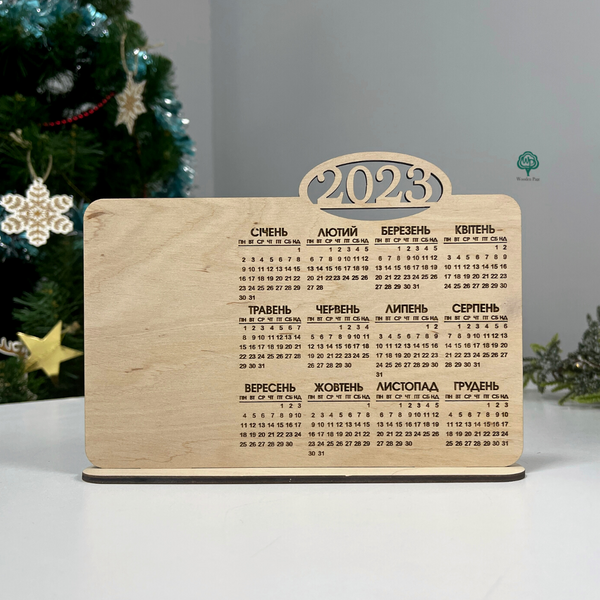 Desk calendar with wooden logo