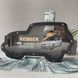 Piggy bank in the shape of a tipping machine