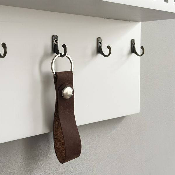 Designer key holder with geometry and shelf