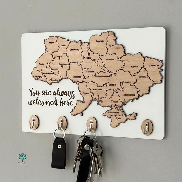 Key holder with a map of Ukraine and an inscription