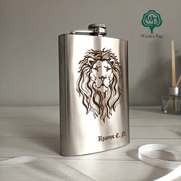 Metal flask for a gift with engraving