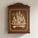 Wall mounted key holder with a door with a picture of a castle