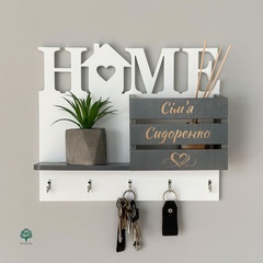 Wall-mounted key holder HOME with family name