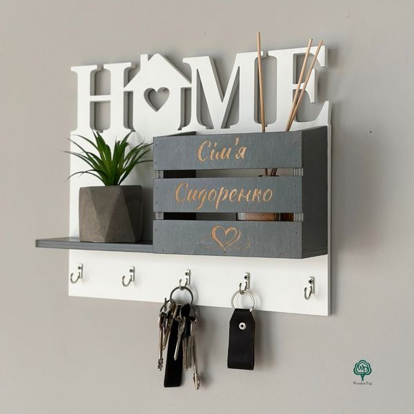 Wall-mounted key holder HOME with family name